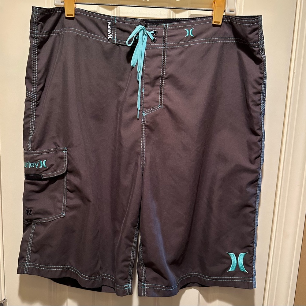 Size 36 Hurley Men's Charcoal Gray Swim Board Shorts with Teal Accents